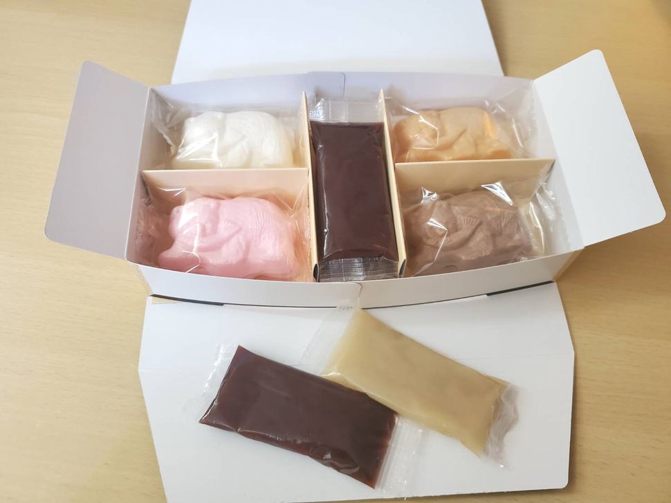 株式会社共同開発システム | 6052 名寄市 カントリーマム 木彫り熊